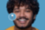 young-man-with-toothy-smile-demonstrating-his-dental-implant.jpg