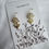 Thumbnail: Gold Dainty Flower Dangly Earrings