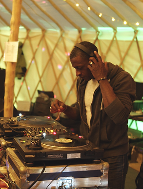 DJ behind a sounding desk