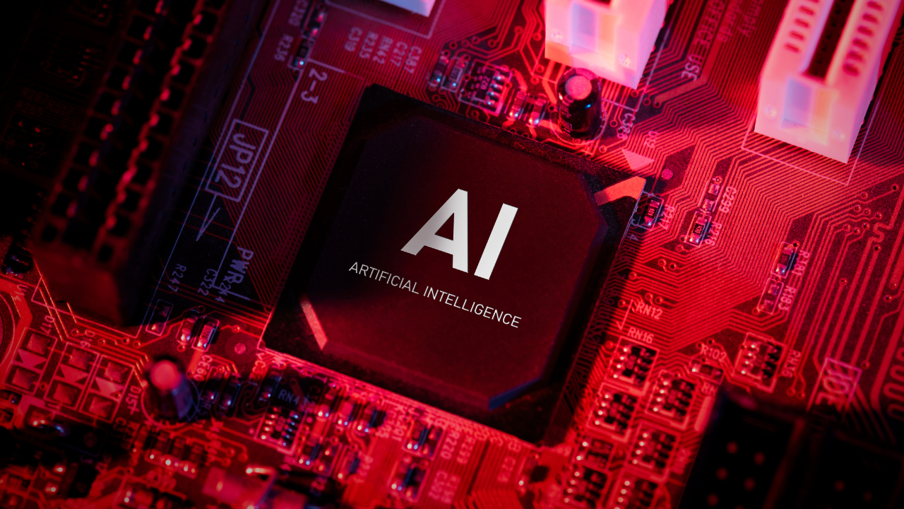 A close-up of a red-lit computer chip labeled "AI – Artificial Intelligence," representing the hardware foundation powering explainable AI systems.
