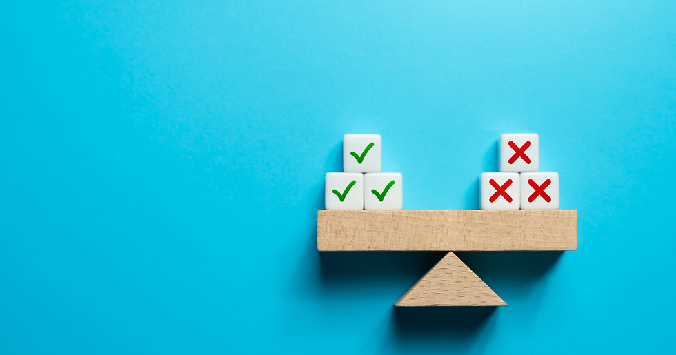 Balancing pros and cons in decision-making, depicted with checkmarks and crosses on wooden blocks placed on a seesaw against a blue background.