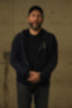 A professional headshot of our Project Manager, Robert Arroyo, showcasing his expertise and dedication in managing our projects.