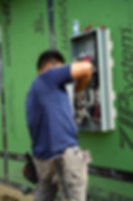 Team lead Jackson Chavez at work, performing a residential electrical meter disconnect as part of the Liberty Park Subdivision project, ensuring safe and reliable electrical services for homeowners.