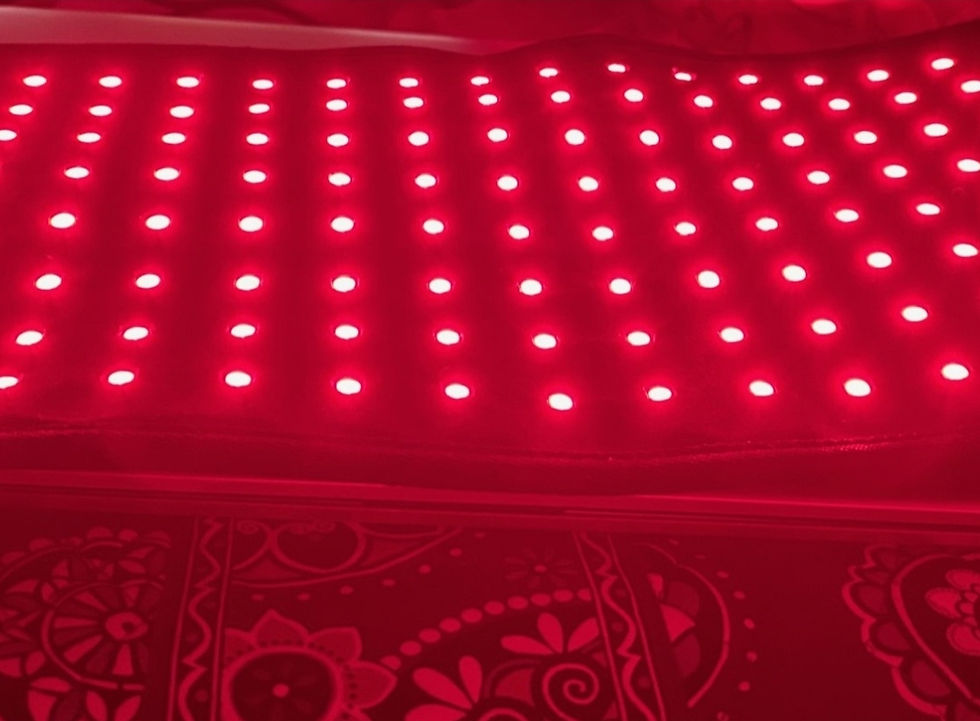 Rows of bright red LED lights on a flat surface, with intricate floral patterns in the foreground, creating a vibrant atmosphere.