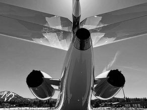 A Boy in a Jet, a Boy on a Beach