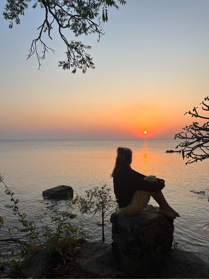 I Dream of Mangoes watching sunset over Lake Malawi