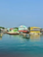 Colourful coastal houses on Utila