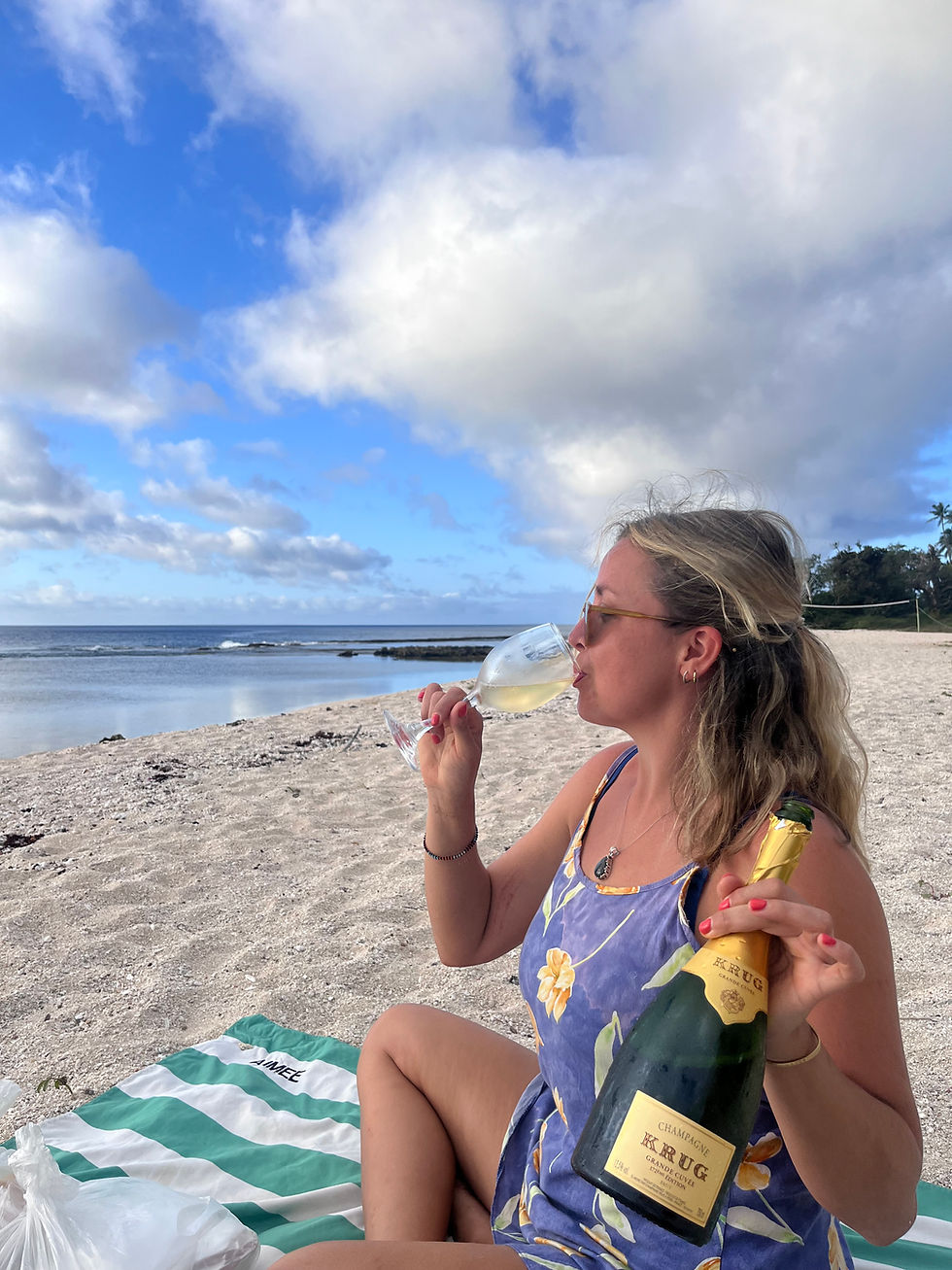 I Dream of Mangoes drinking a bottle of Krug in Tonga