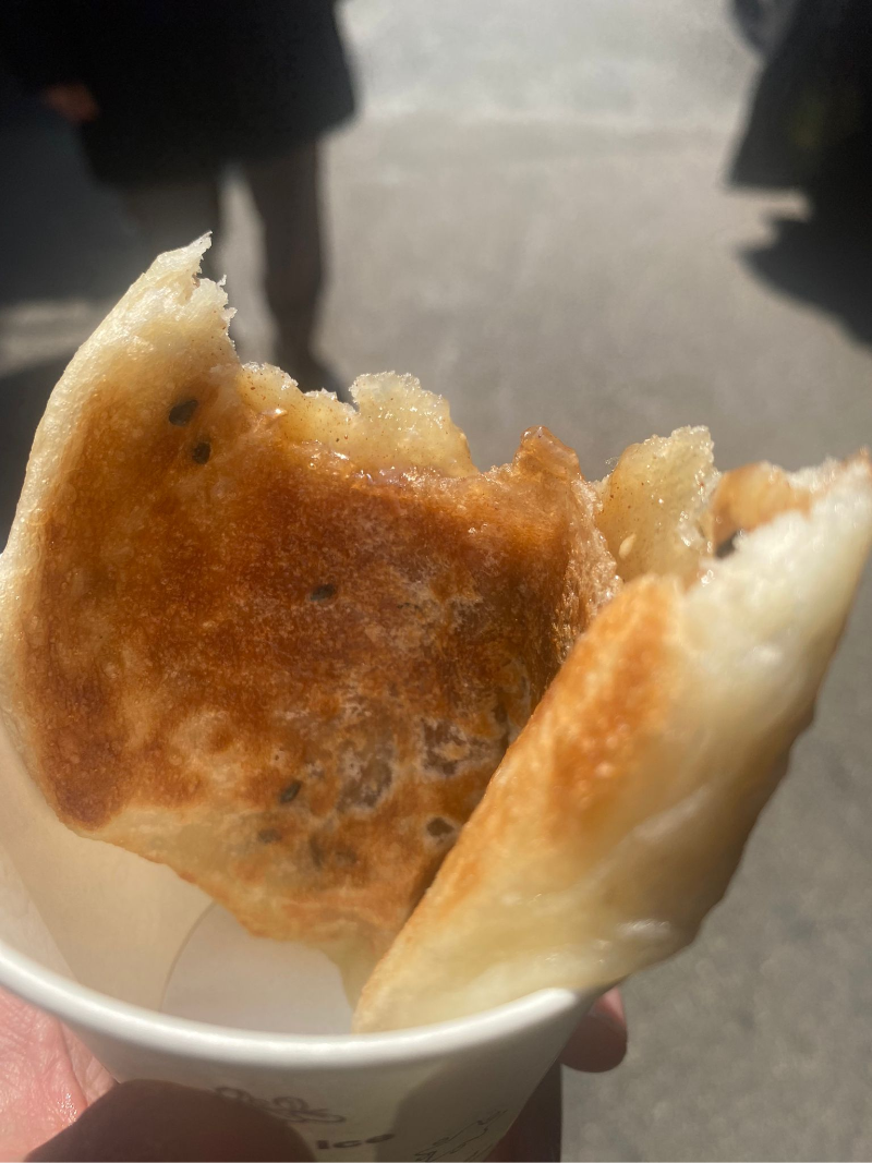 Half eaten honey and pumpkin seed Hotteok