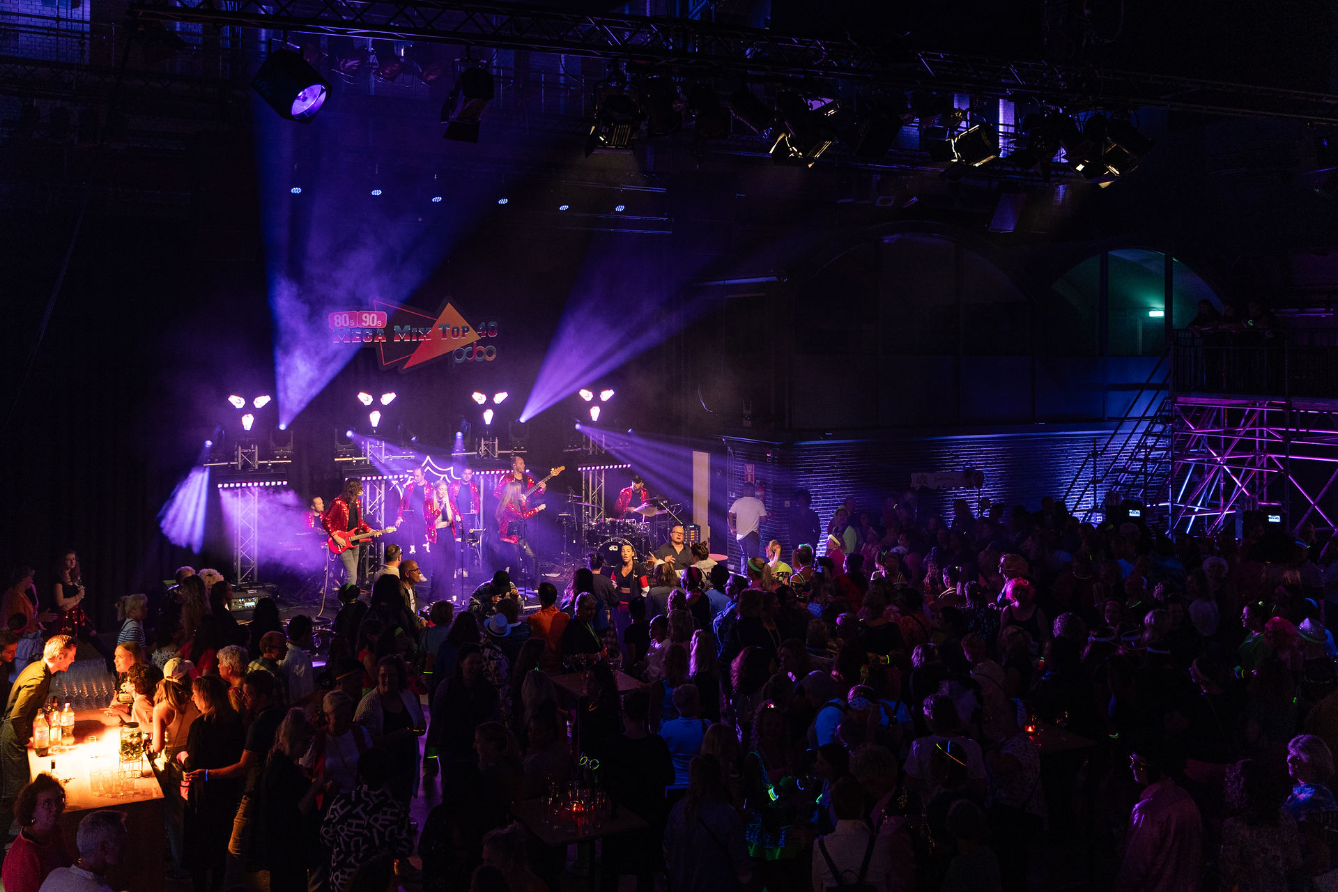 YourBand at a big corporate party