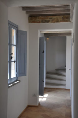 light hallways leading to the rooms