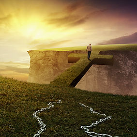 a-man-breaks-from-his-chains-and-walks-on-a-bridge-SBI-301081192.jpg