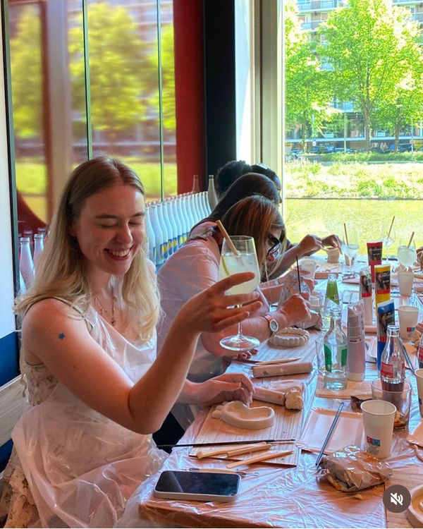 Guests raising a glass during a workshop