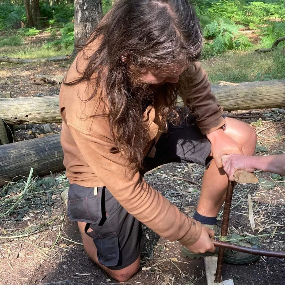 Fire by friction using a bow drill