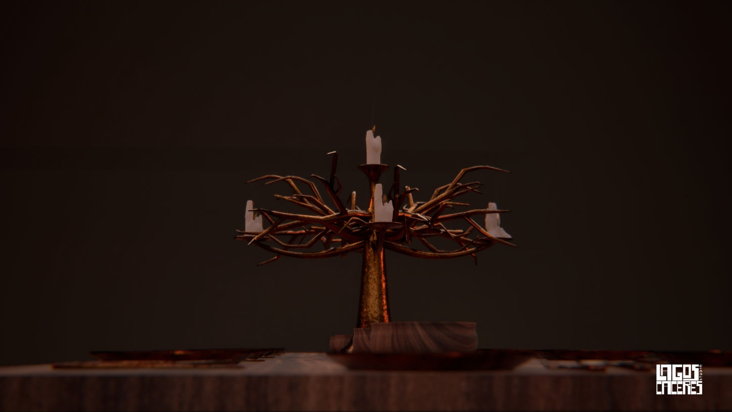 Center-focused image of a branch-like, dark gold candelabra centerpiece holding unlit white candles, set on a dark wooden table with blurred plates in the foreground.