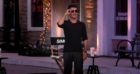 Simon Cowell arrives at AGT 'Judges Cuts' to a Drive-In movie set 