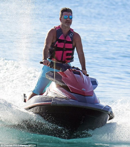 Simon Cowell and his family start their Christmas break in Barbados