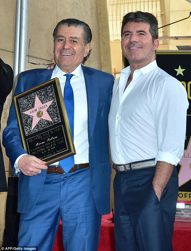 Simon Cowell and Haim Saban at Hollywood Walk of Fame