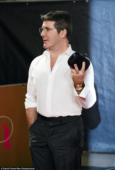 Simon Cowell Left Holding Lauren Silverman's Handbag At The ITV Gala