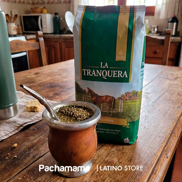 La Tranquera Tradicional Argentine yerba mate 500g pack in a traditional mate setting