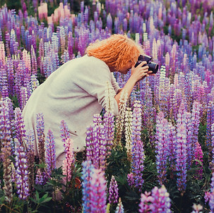 Capture red hair woman with purple flowe