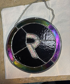 This piece has black iridescent glass encircling a rainbow clear pattern glass. I made this as a gift for Prophet Lovy.