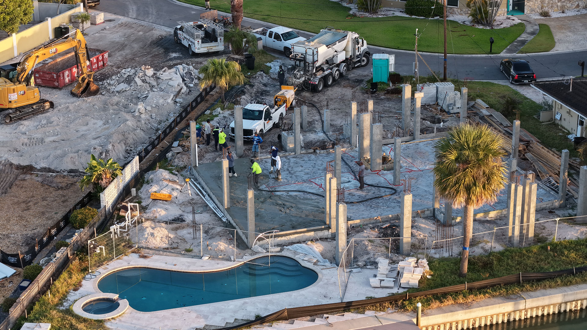 Drone shot of the construction and concrete pour