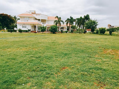 Lawn to villa view of Anand Farms party lawn , Chennai's finest and affordable outdoor wedding and event venue within city limits.