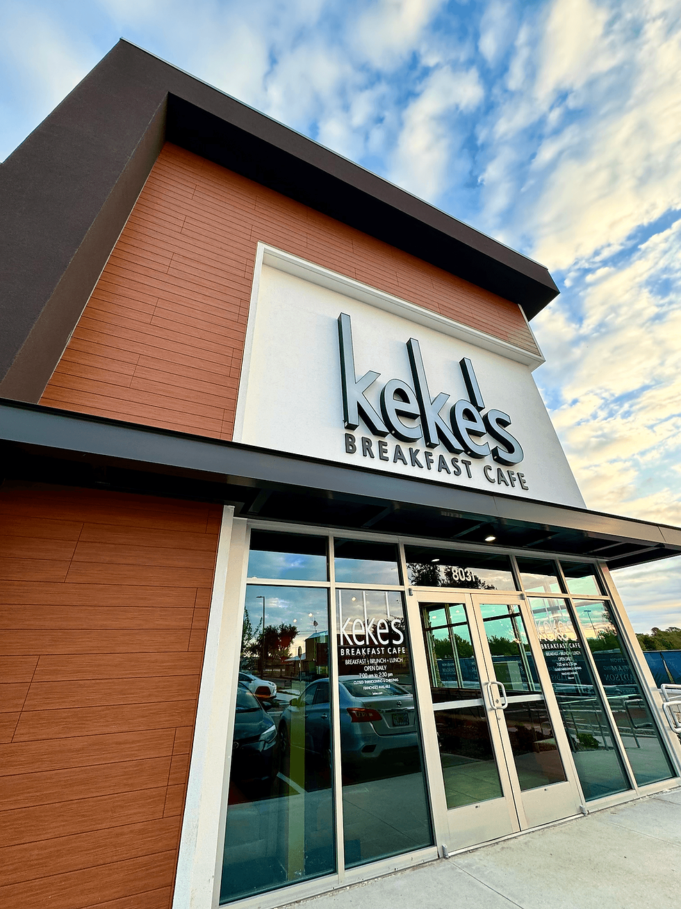 Keke's Breakfast Cafe storefront with blue sky behind