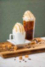 Keke's Breakfast Cafe caramel hot coffee and caramel iced coffee topped with whipped cream and caramel drizzle