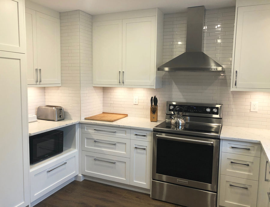Kitchen with chimney hood fan