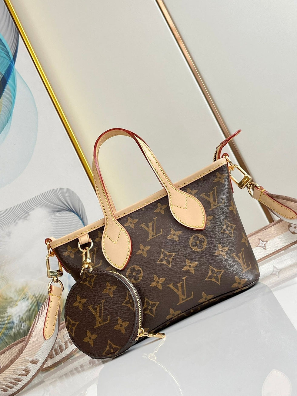 Thumbnail: NEVERFULL BB 24 BROWN MONOGRAM CANVAS AND LEATHER TRIM GOLD — Monogram Canvas