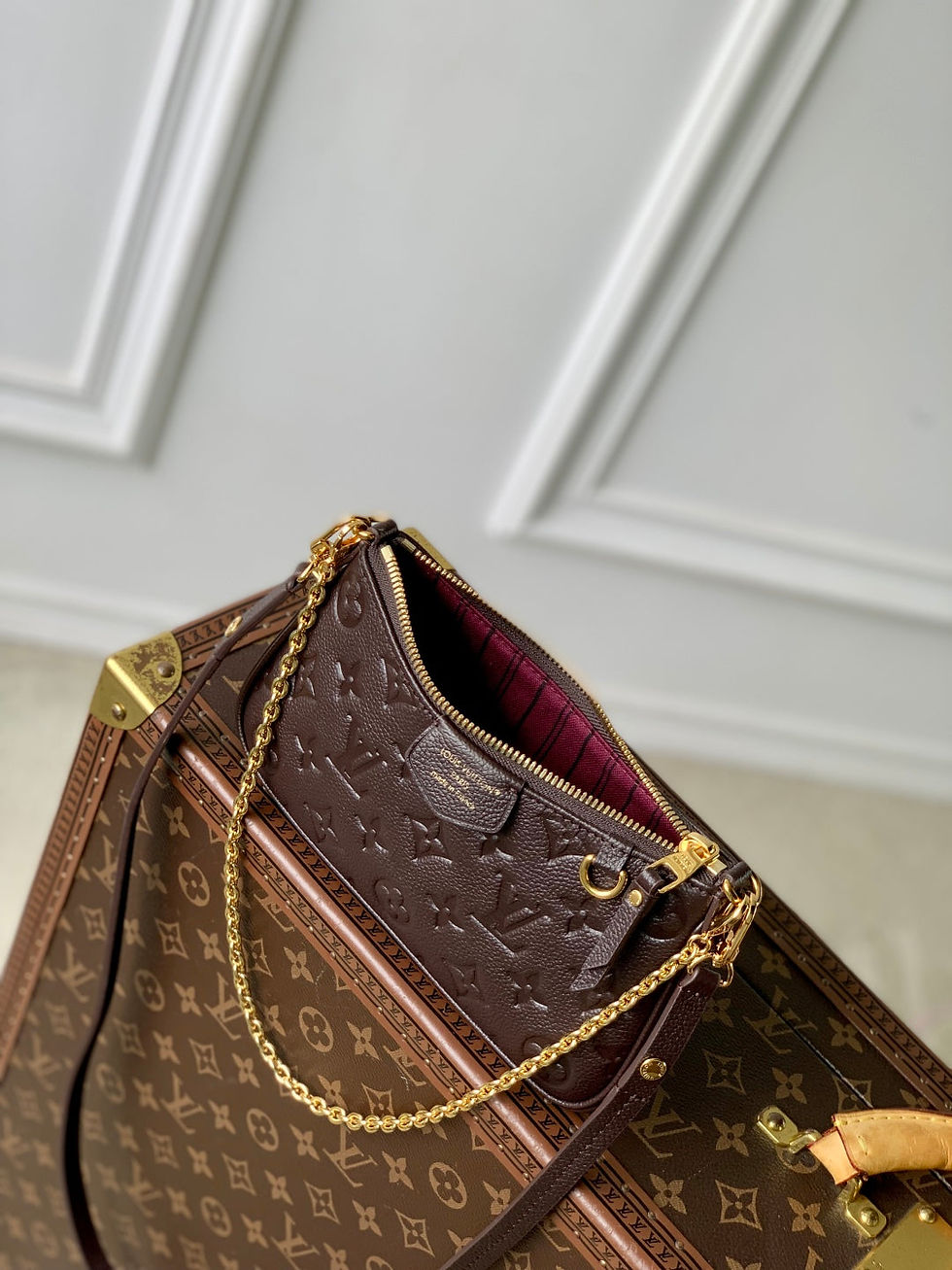 Thumbnail: EASY POUCH ON STRAP 19 IN DARK BROWN MONOGRAM EMBOSSED LOGO — Monogram Canvas