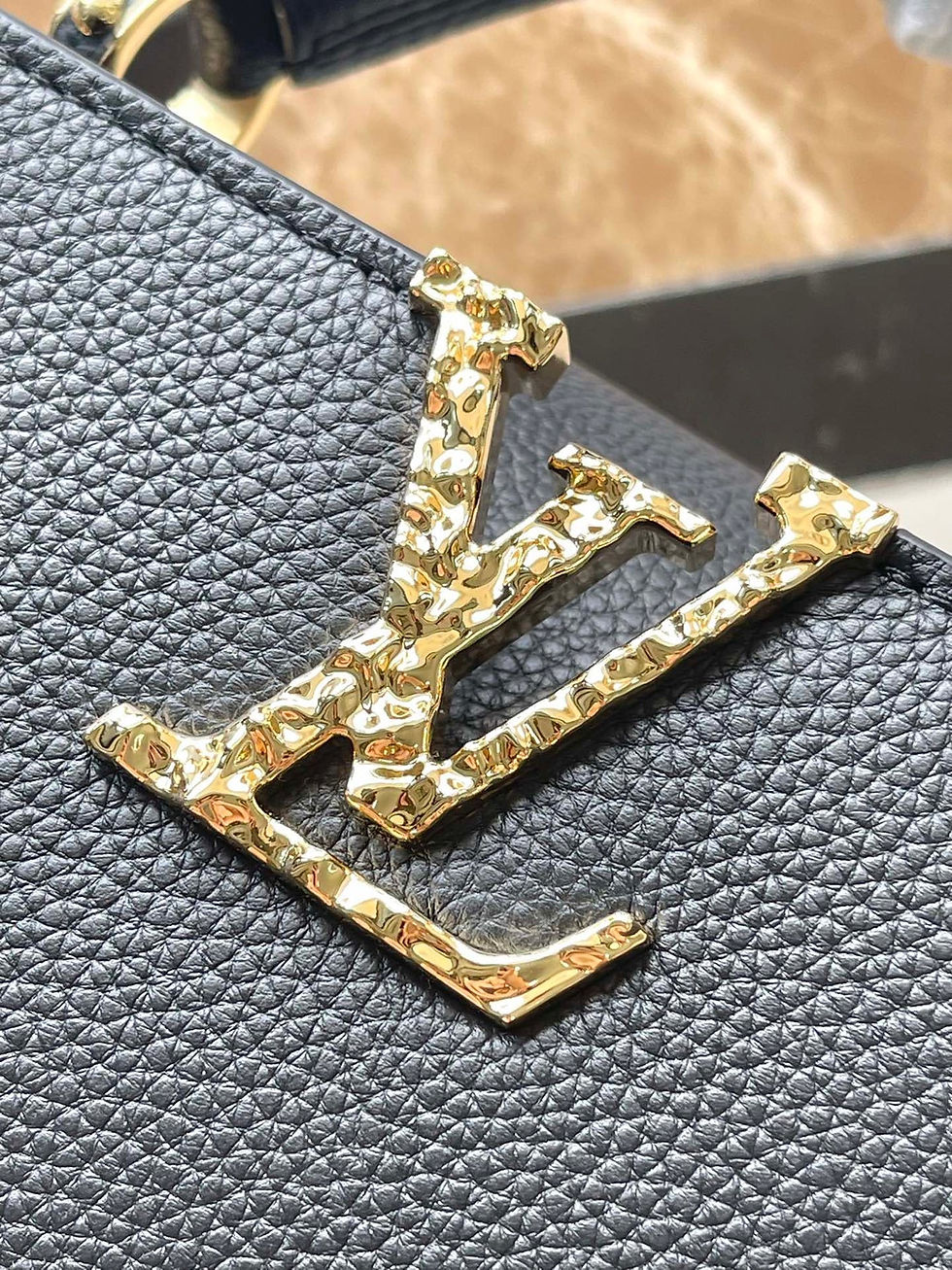 Thumbnail: CAPUCINES EAST-WEST MINI 22 IN BLACK CALFSKIN GOLD HARDWARE — Monogram Canvas