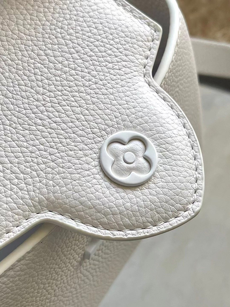 Thumbnail: Louis Vuitton CAPUCINES EAST-WEST MINI 21 IN WHITE TAURILLON