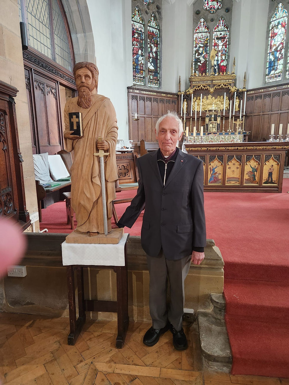 The new statue with the sculptor.