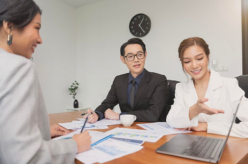 asian-business-people-meeting-stock-brokers-looking-graphs-indexes-numbers-computer_74952-