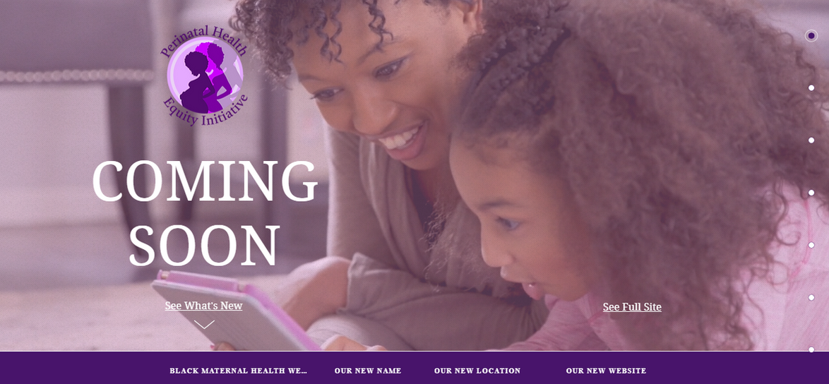 Mother and daughter reading e-book on tablet