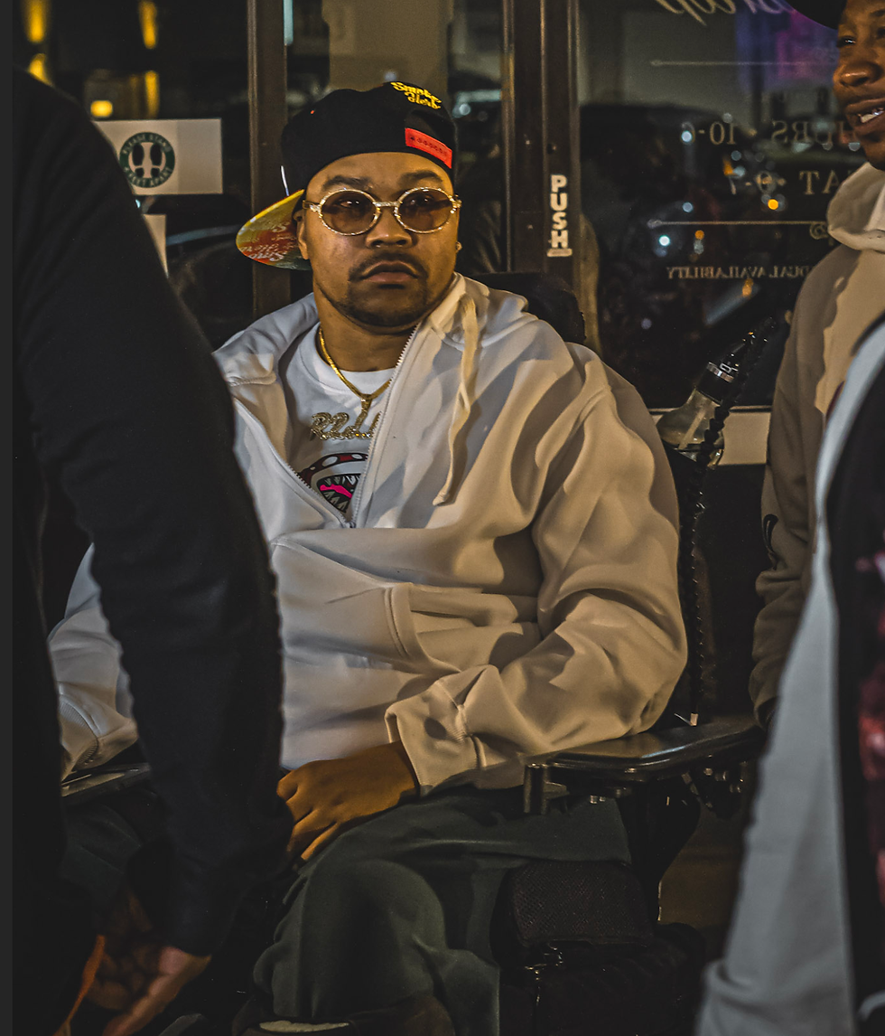 Close-up view of a vibrant mural depicting themes of identity and resilience