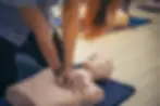 A Person Training To Do CPR during a CPR AED Course