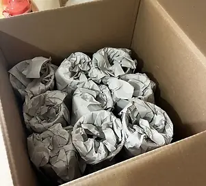 Eipic Removals packing service wrapping fargile items on a house move in Cookstown.webp