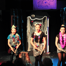 Three young actresses singing on stage, I Dream I Dream