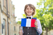 French-boy-holding-french-flag.jpg