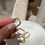Thumbnail: Gold Beaded Oval Hoop Earrings
