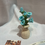 Thumbnail: Crocheted Blue Flower Arrangement in a Beige Vase