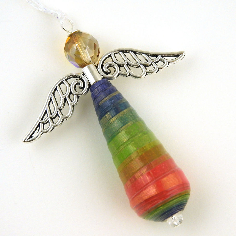 Thumbnail: Blue, green, and red paper bead angel ornament laying diagonally on a white background.
