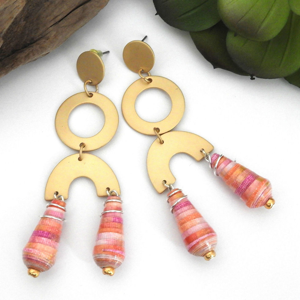 Gold earrings with pink, orange, and purple paper beads on a white background.