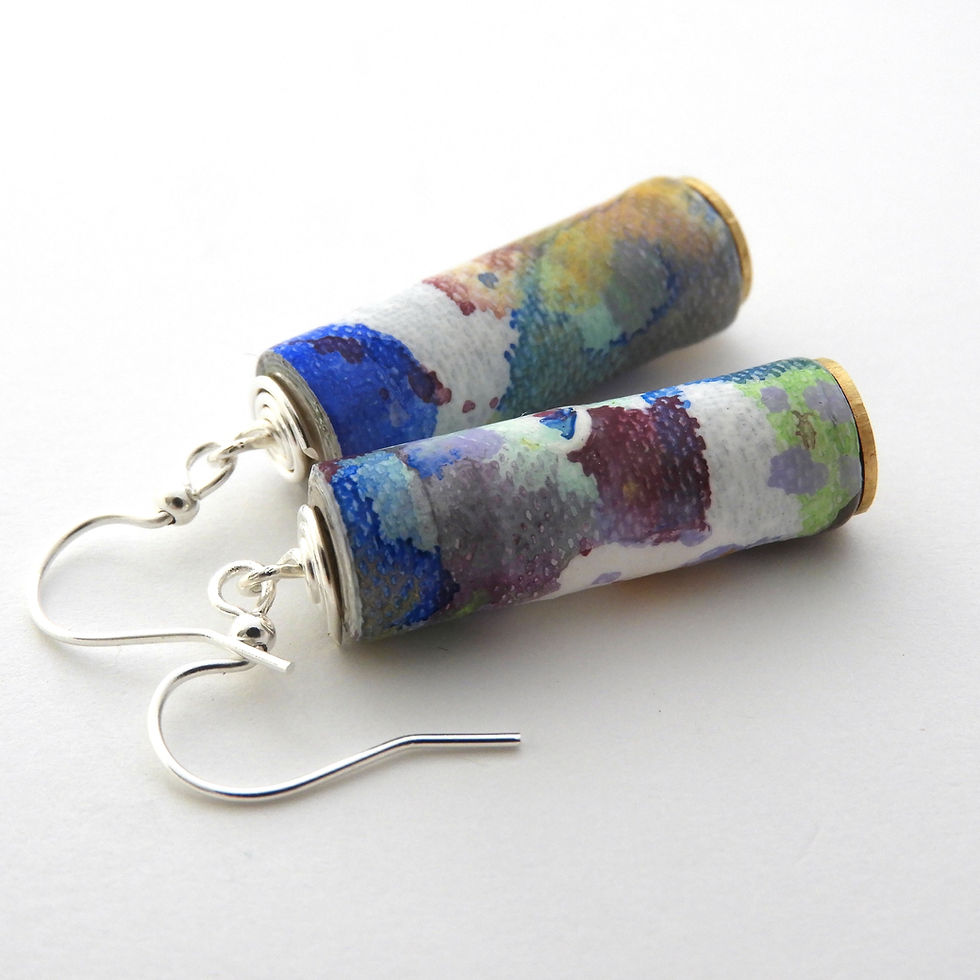 Thumbnail: White, purple, blue, green, and gold paper bead earrings on a white background.