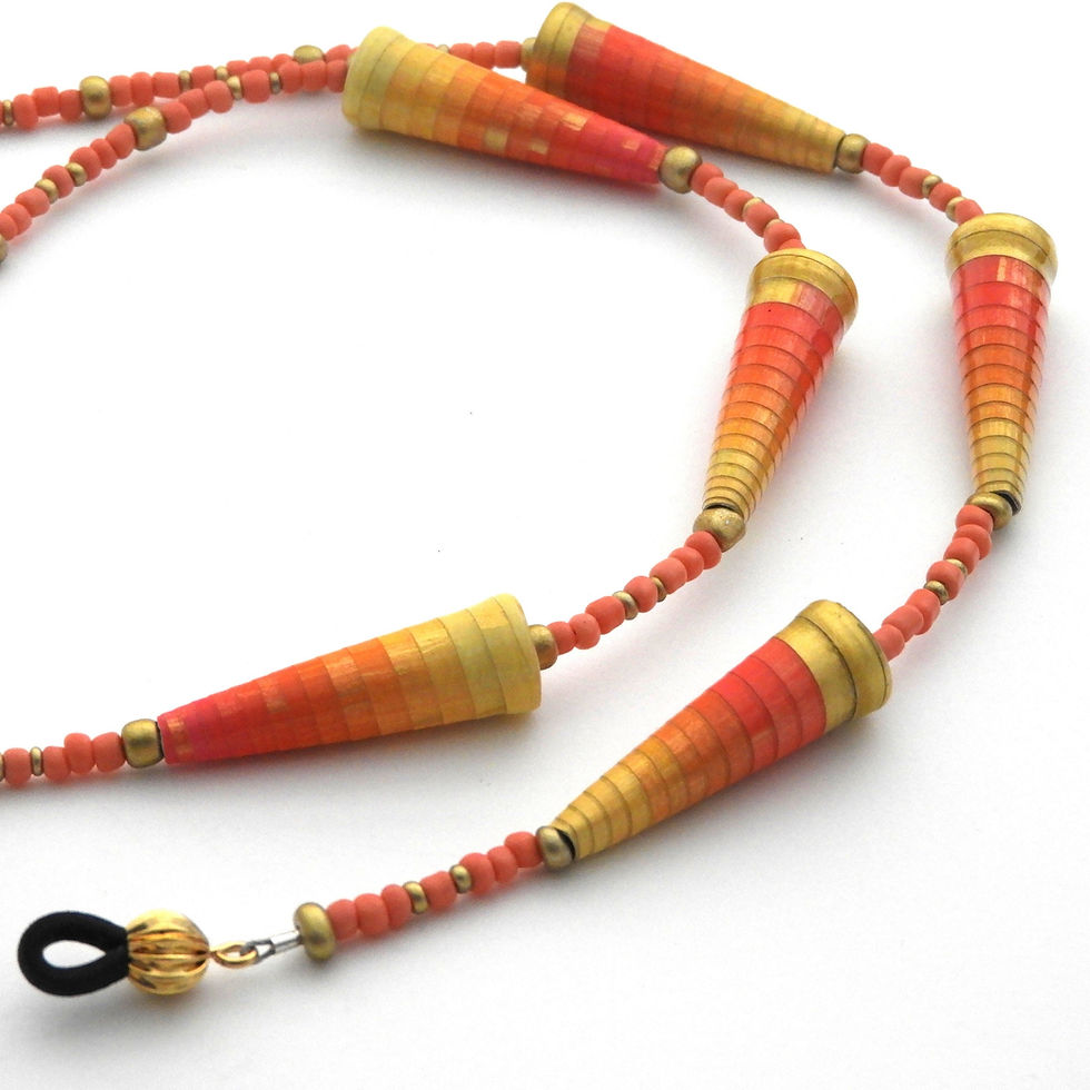 Thumbnail: Coral, orange, yellow, and gold paper bead eyeglass chain on white background.