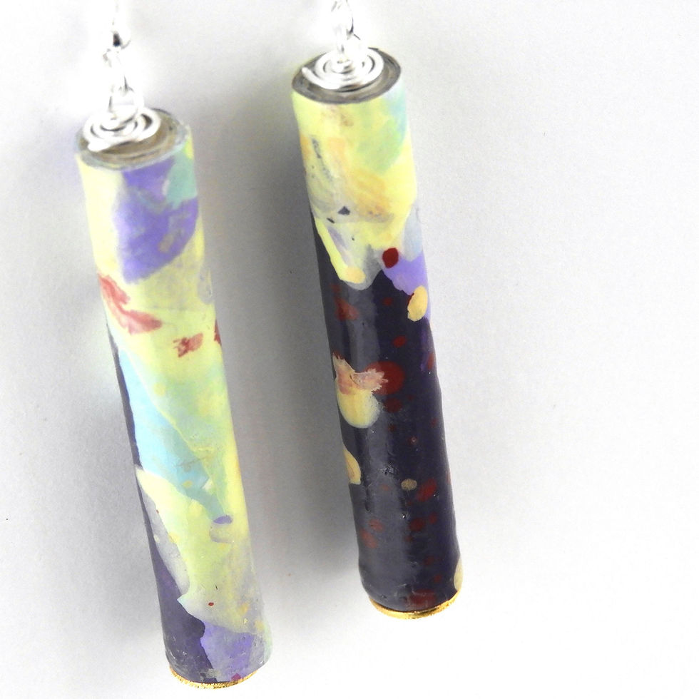 Thumbnail: Yellow, purple, aqua, and gold abstractly painted paper bead earrings hanging on a white background.